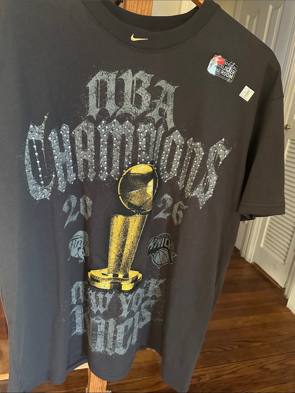 Nike Black Tee with Gold Trophy NBA Champions Graphic